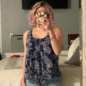 Woman’s blue tank top